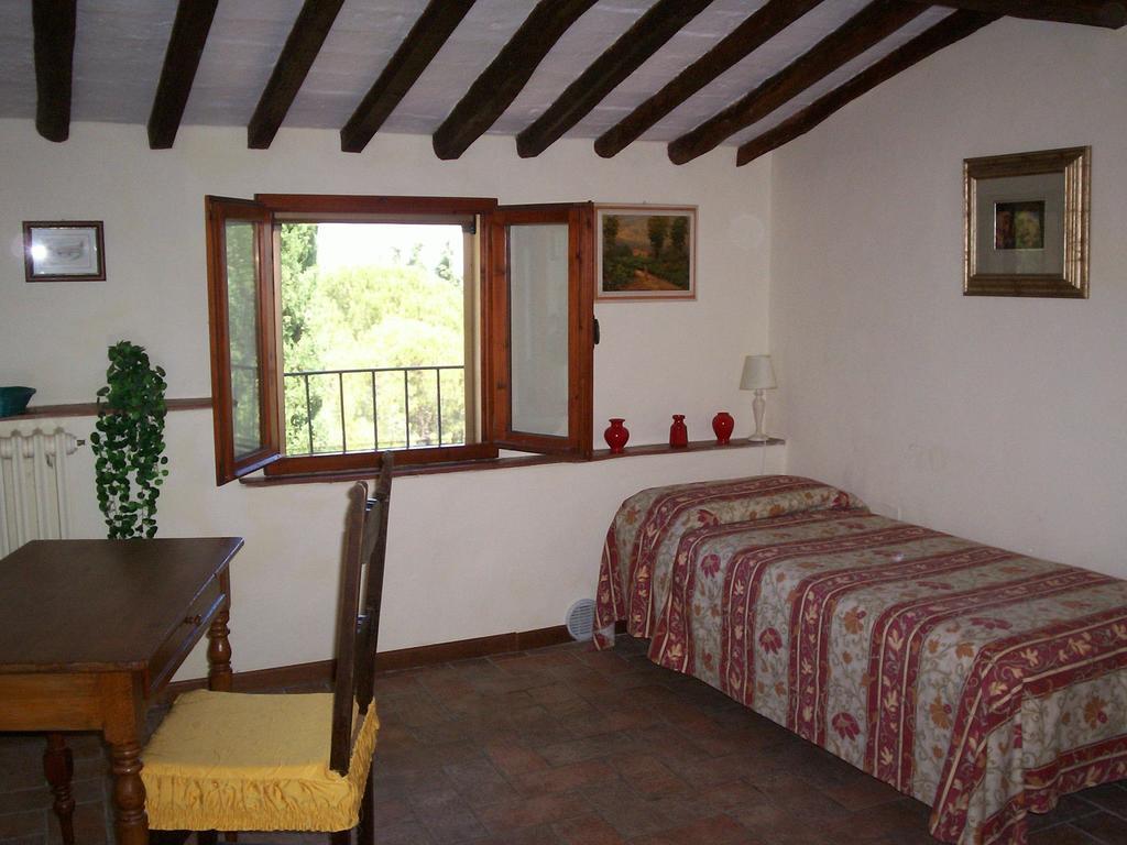Podere Il Caggio Rooms Сан-Джиміньяно Номер фото